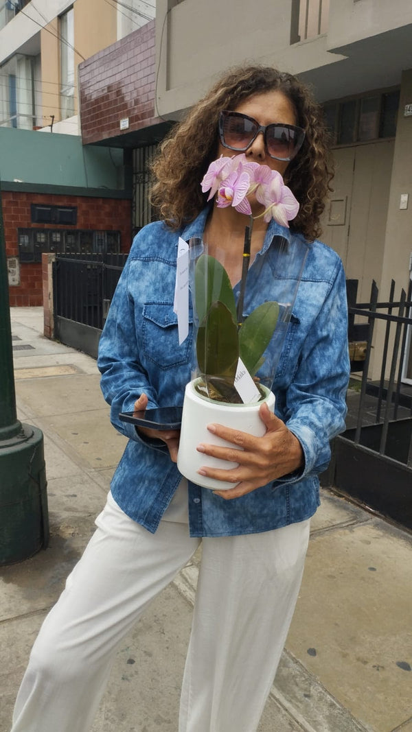 Cliente de ORKIDEA con su orquídea